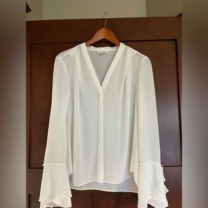 Calvin Klein Chiffon Blouse in Cream White with Bell Sleeve and V neck. …